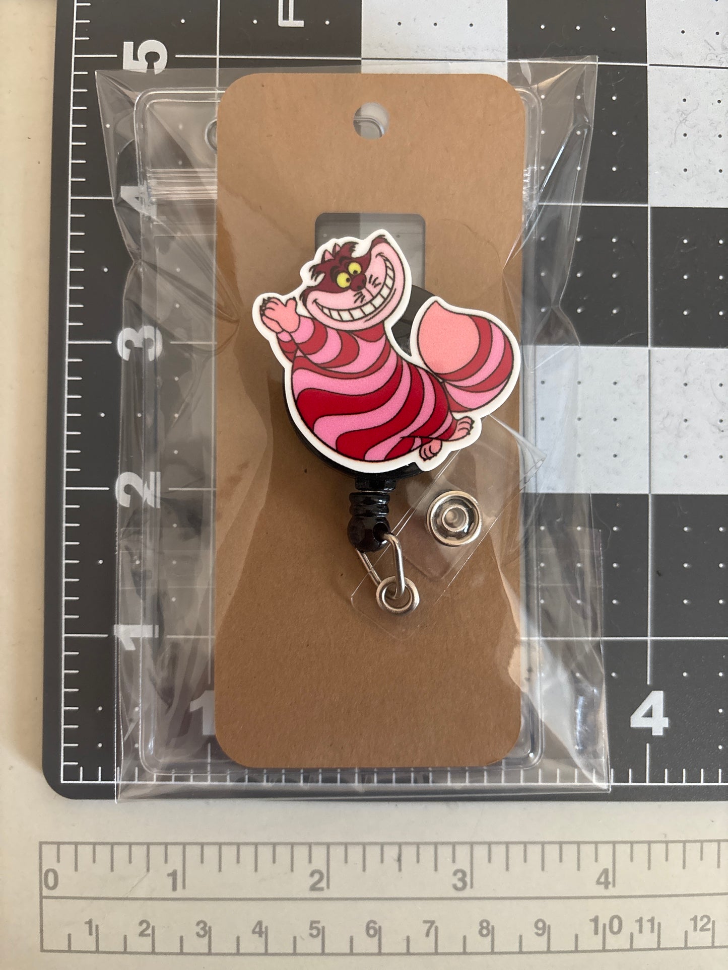 Cheshire Cat Resin Badge Reel